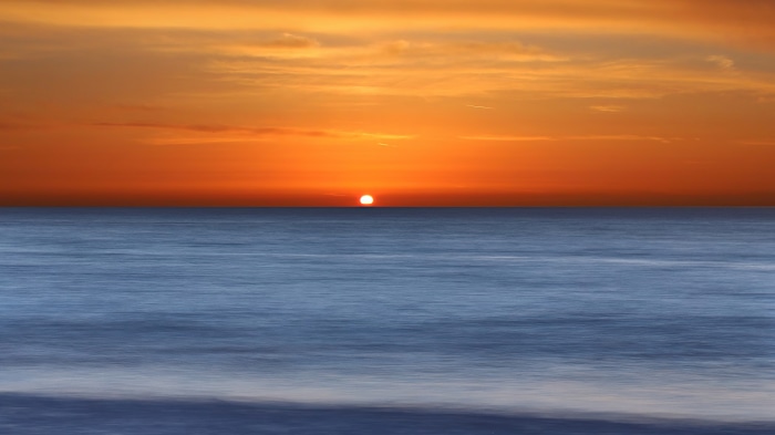 Sunset over the ocean 4K