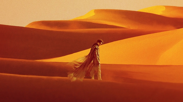 Paul Atreides walking through desert dunes in Dune 4K