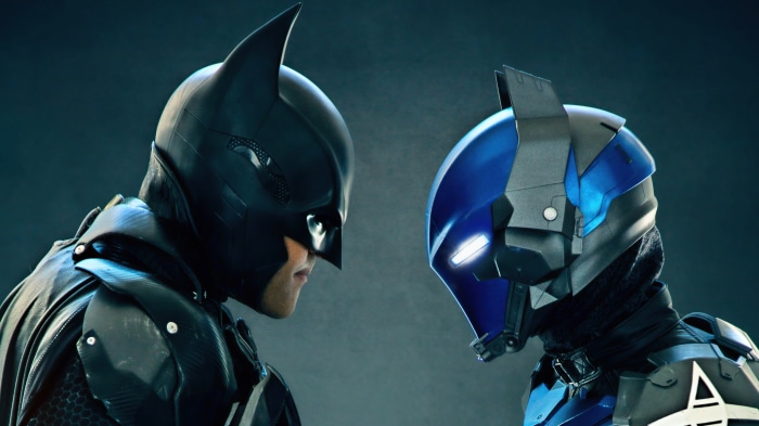 Batman and Deathstroke facing each other