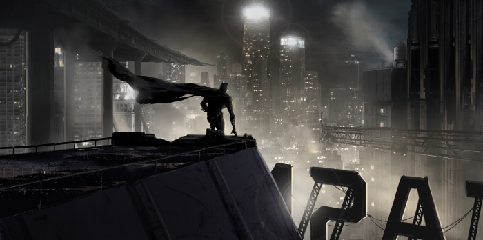 Batman overlooking a futuristic city