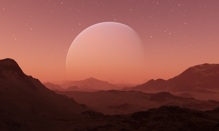 Alien planet landscape with a large planet in the sky