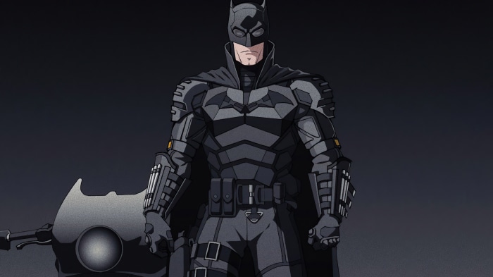 Batman from DC Comics standing next to a motorcycle