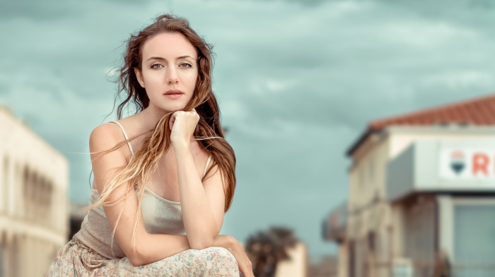 Woman with long brown hair outdoors