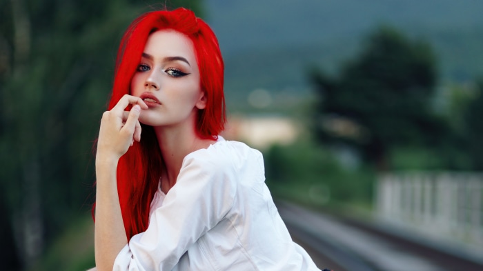 Redhead model in white shirt