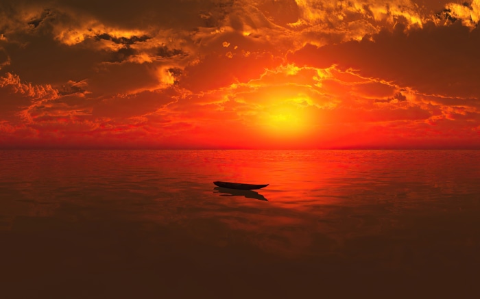 Boat on the ocean during a vibrant sunset 4K
