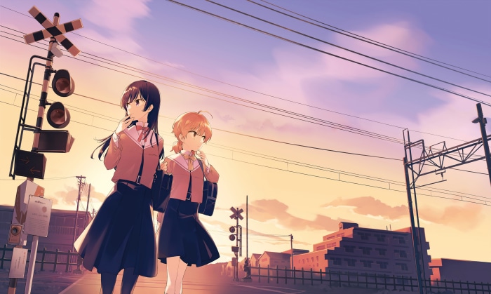 Two girls at a train crossing