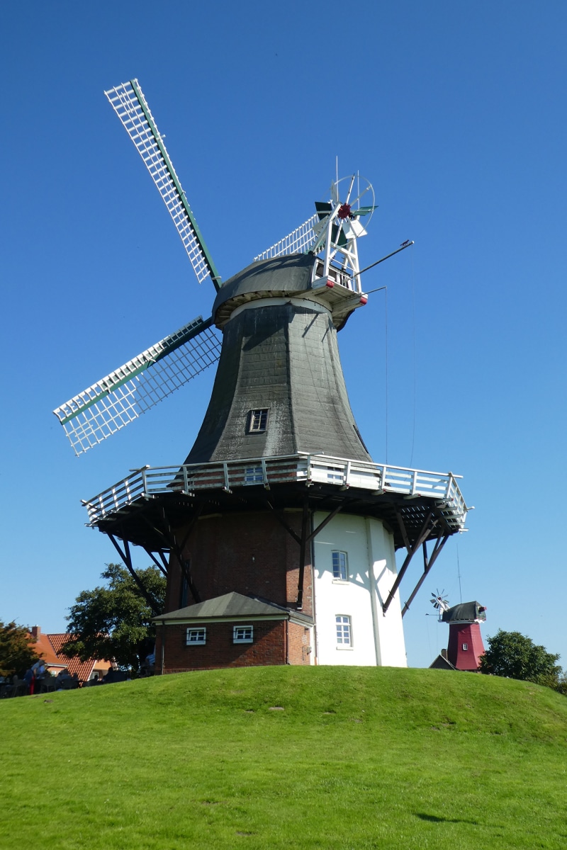 Windmills in Germany under a clear blue sky