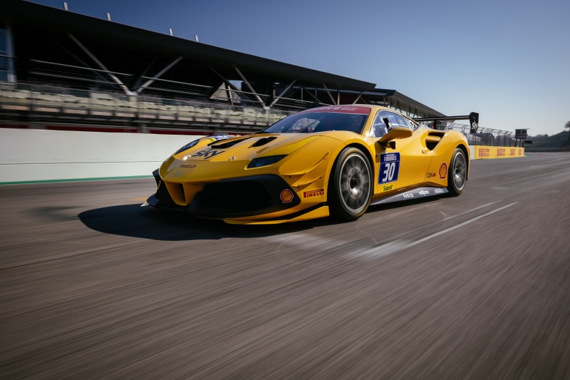 Yellow Ferrari 488 Challenge Evo on Race Track