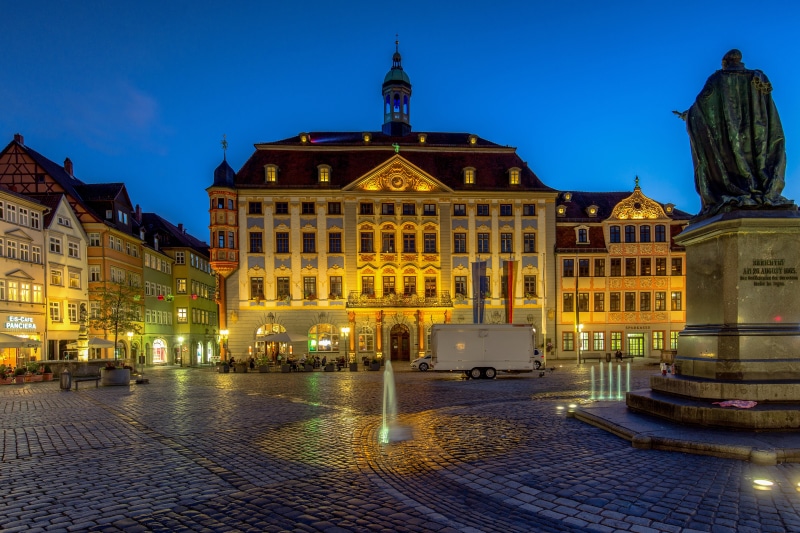 Coburg Town Square with Monument and Buildings at Dusk