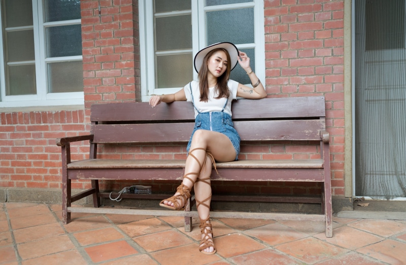 Asian Hat Brown haired Sitting Hands Skirt Legs