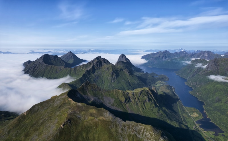 Lofoten Mountains and Fjord with Clouds in Norway