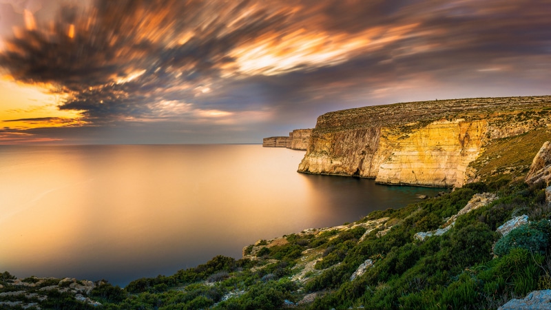 Cliffs and sea at sunset in Gozo, Malta