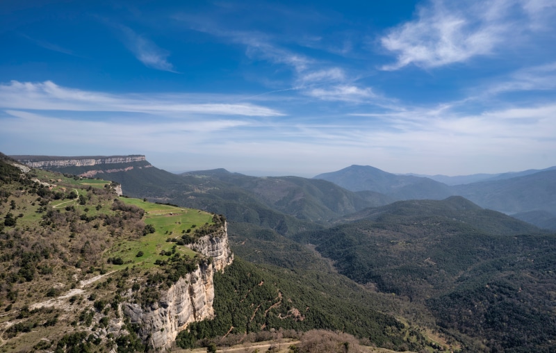 Mountains and cliffs in Catalonia, Spain under a blue sky