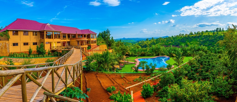 Hotel with pool and wooden bridge in Karatu, Tanzania