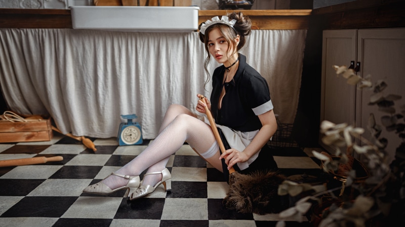 Maid costume with stockings and stilettos