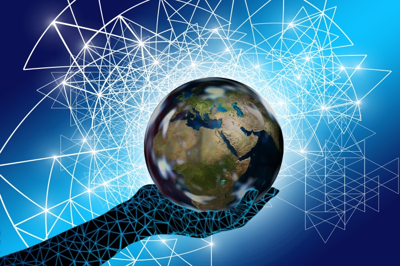 4K Earth Held in Digital Hand with Network Background