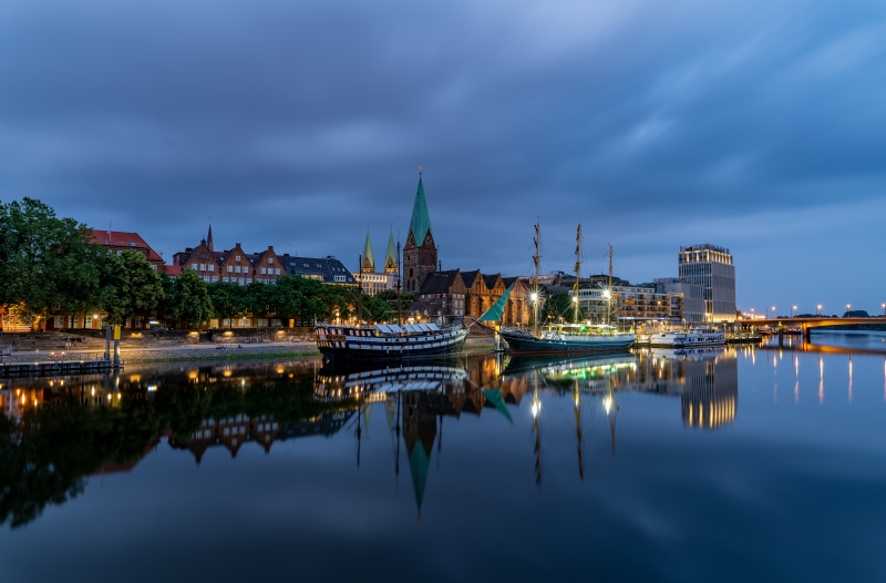 Bremen Germany Riverfront with Ships and Buildings