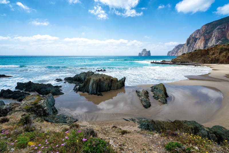 4K Sea Coast with Rocks and Cliffs in Nebida, Italy