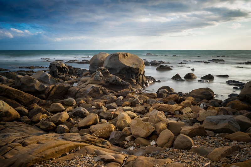 4K Coastline with Stones and Sea in Santa Marinella, Italy