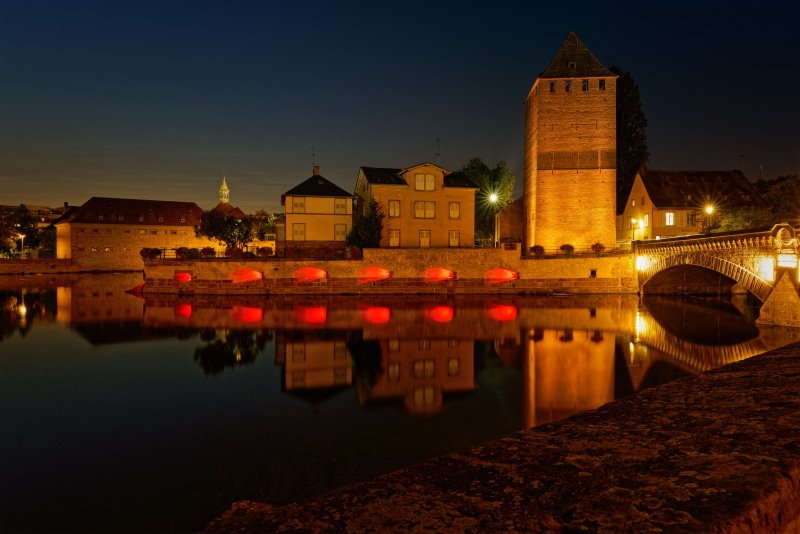 Strasbourg France River at Night with Tower and Bridge