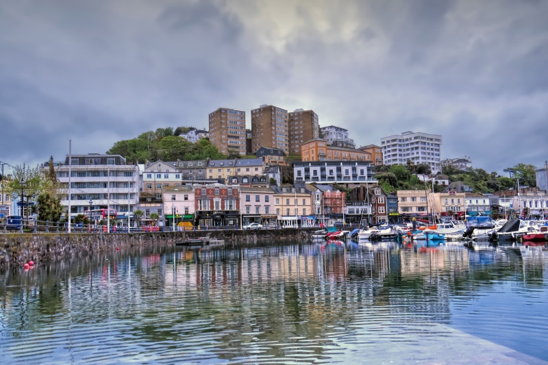 Torquay England waterfront with buildings and boats