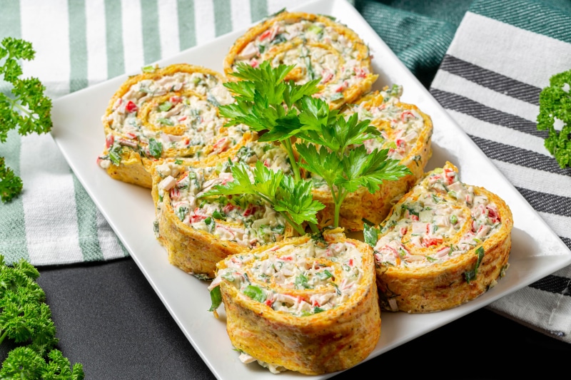 Sliced cheese omelette roll with filling