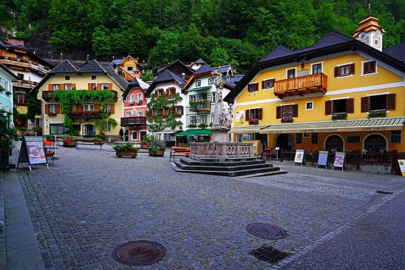 Hallstatt Town Square with Fountain and Colorful Houses