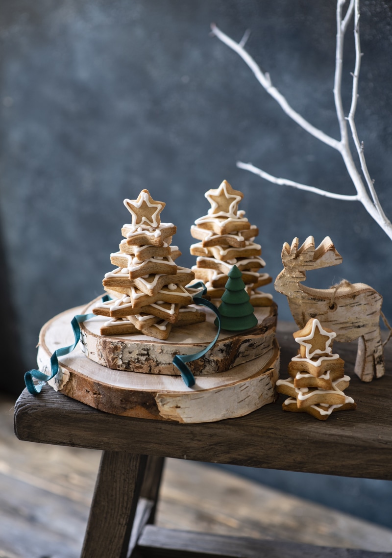 Christmas gingerbread cookies and wooden deer decoration