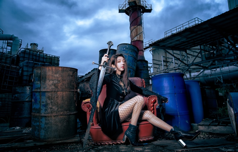 Woman with Sword in Industrial Area