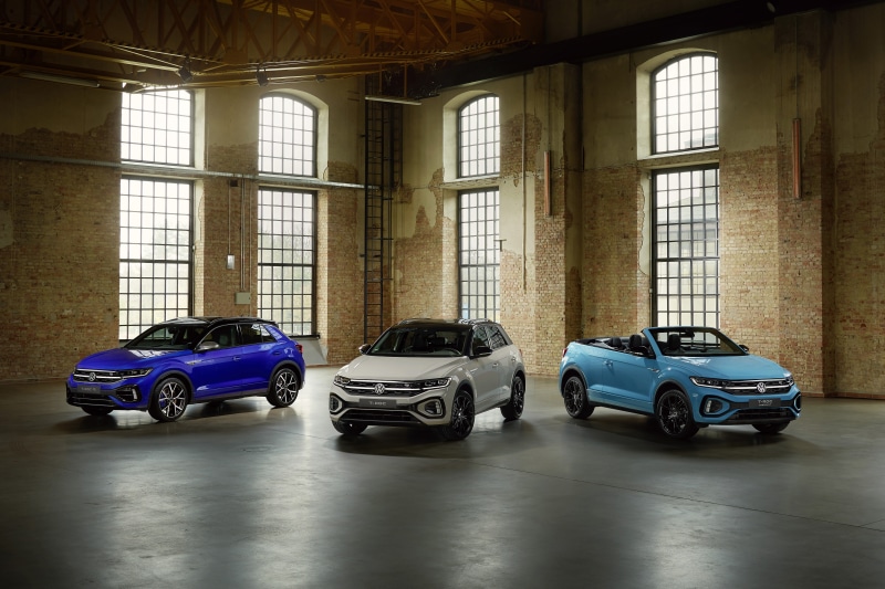 Three Volkswagen T-Roc Cars in a Warehouse