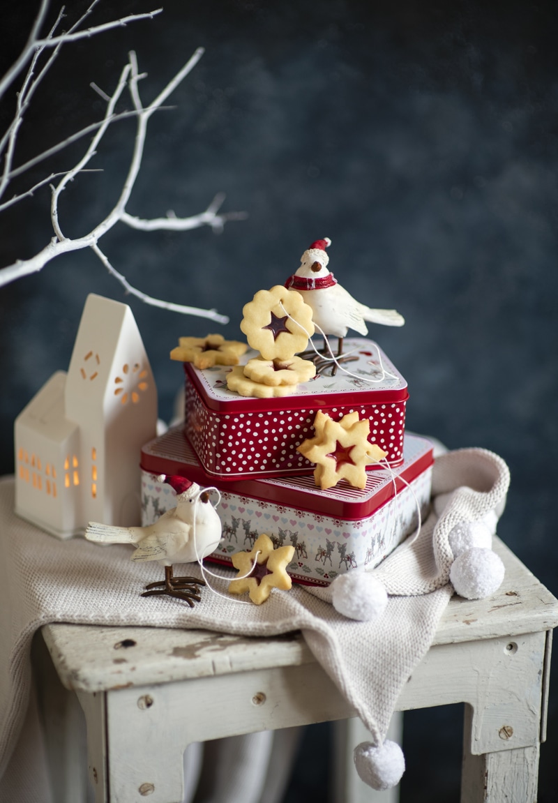 Christmas cookies and decorations on a table