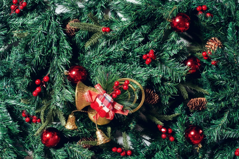 Christmas garland with ornaments and pine cones
