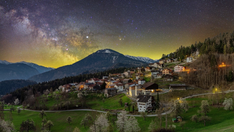 Village in the Alps under the Milky Way