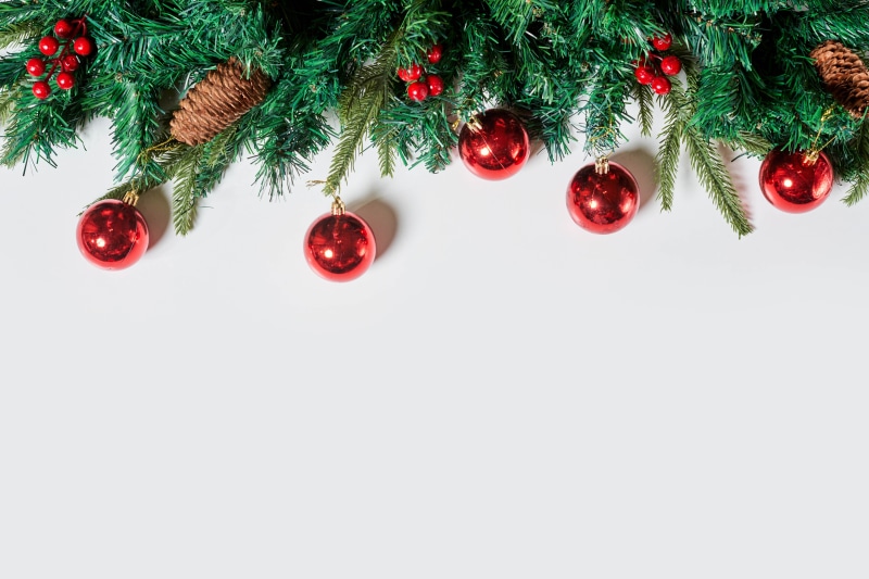 Christmas Garland with Red Ornaments and Pine Cones