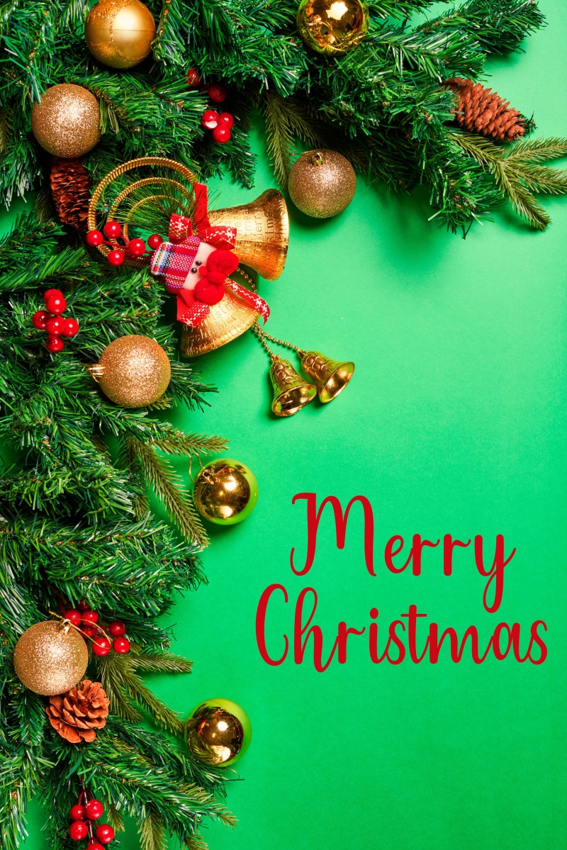 Merry Christmas text with festive decorations