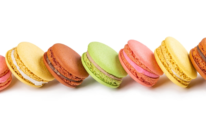 Multicolor macarons on a white background