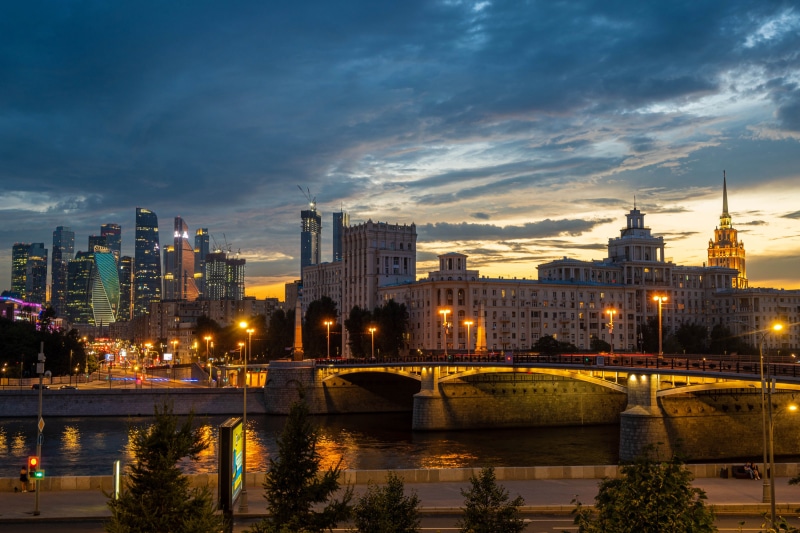 Moscow skyline with Borodinsky Bridge at dusk