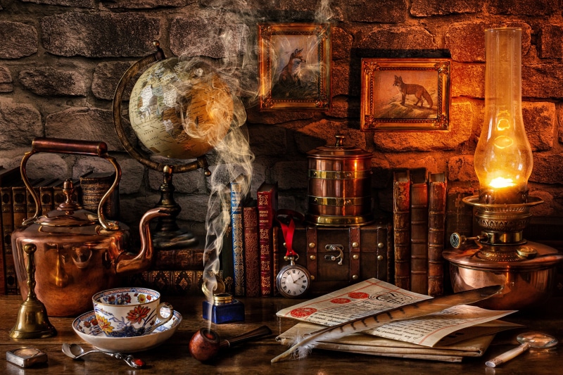 Still life with kettle, globe, books, and oil lamp