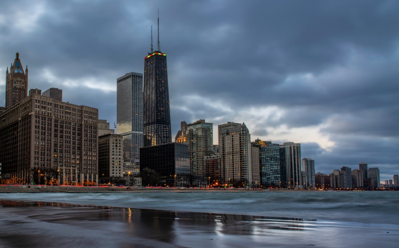 Chicago city skyline at dusk with lake