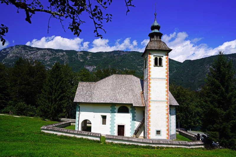 Church in Bohinj, Slovenia with Mountains