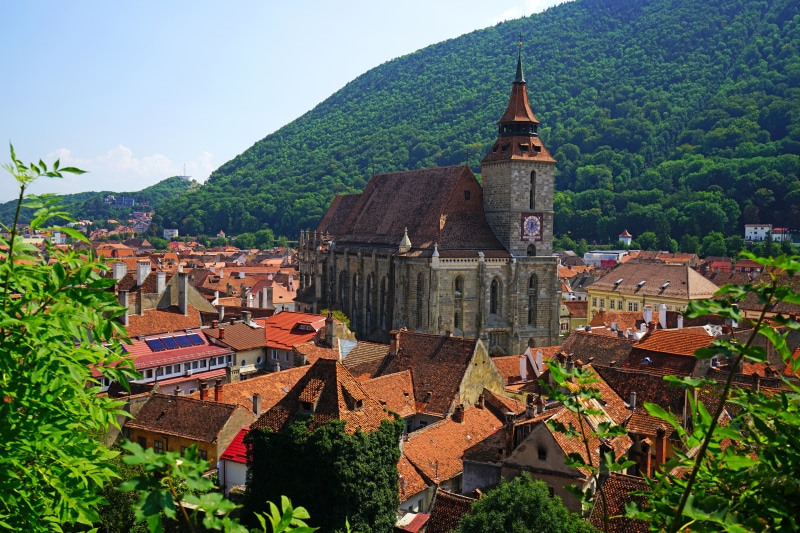 Black Church and Brasov cityscape with mountains