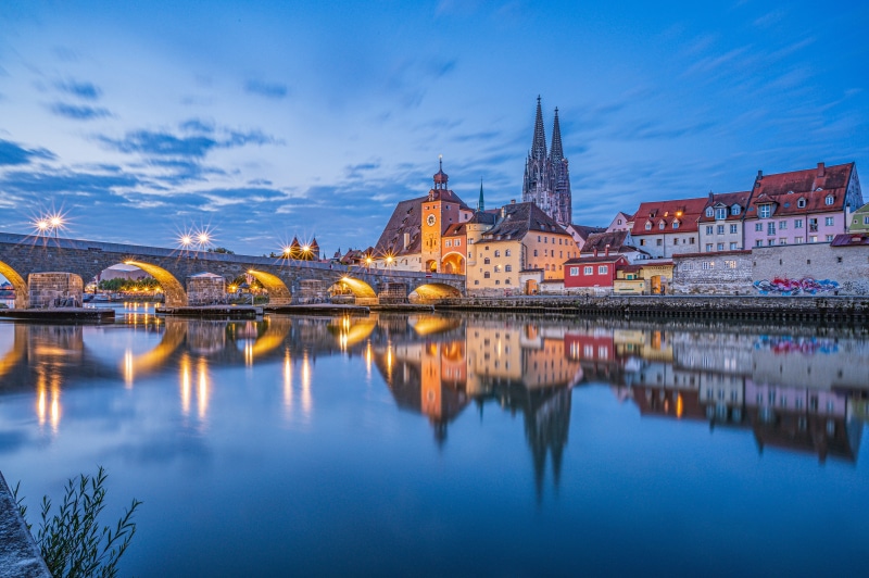 Regensburg, Germany: Stone Bridge and Old Town at Dusk
