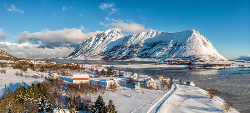 Snowy mountains and village in Lofoten, Norway