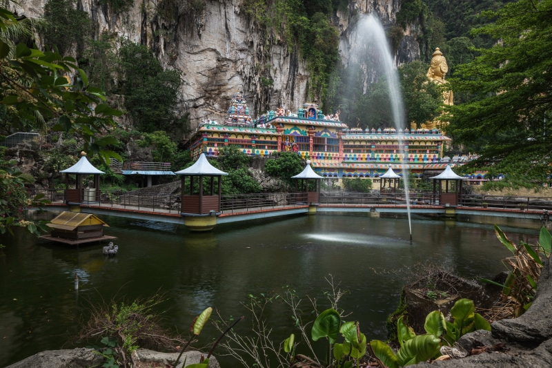 Batu Caves Temple with Fountain and Pond in Malaysia