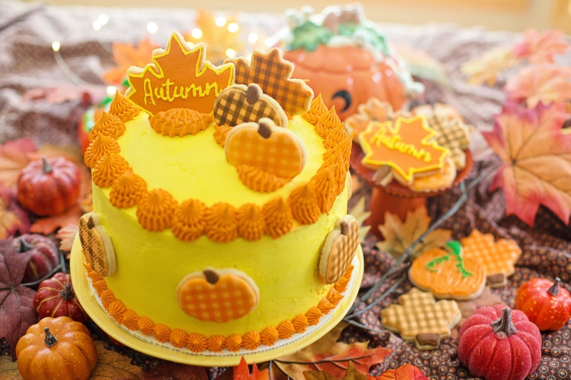 Autumn cake with pumpkin and leaf cookies