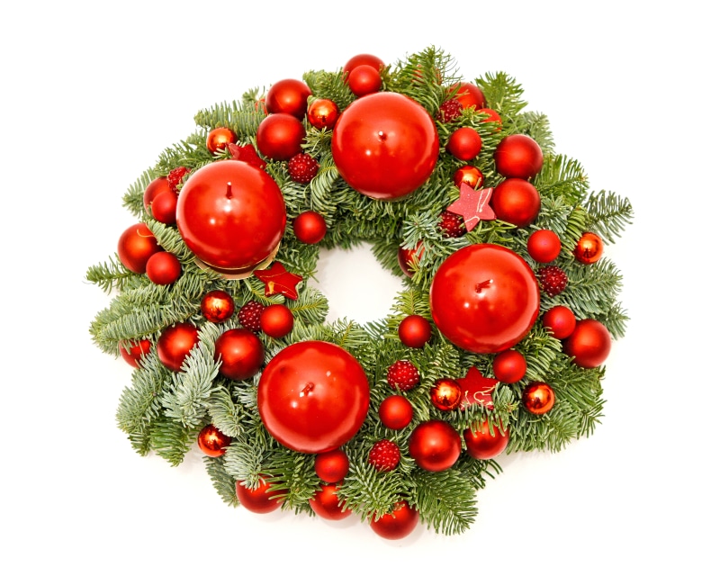Christmas wreath with red candles and ornaments