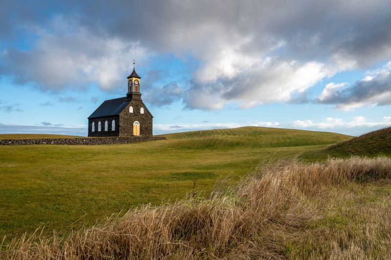 4K Hvalsneskirkja Iceland Church with Clouds