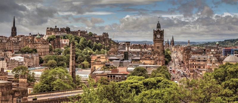Edinburgh cityscape with castle and clock tower