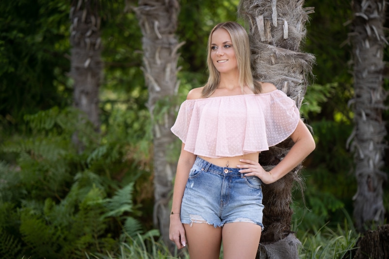 Blonde girl in shorts and crop top