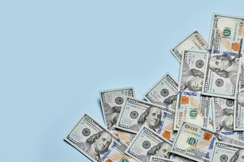 4K Money Banknotes Dollars on Colored Background